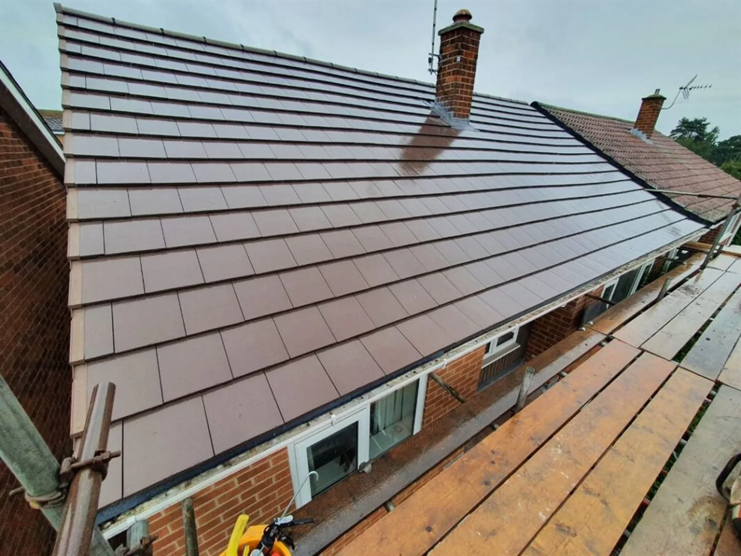 A newly installed roof viewed from the scaffolding platform